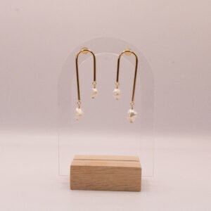 Gold-Fill U-shaped freshwater pearl earrings.