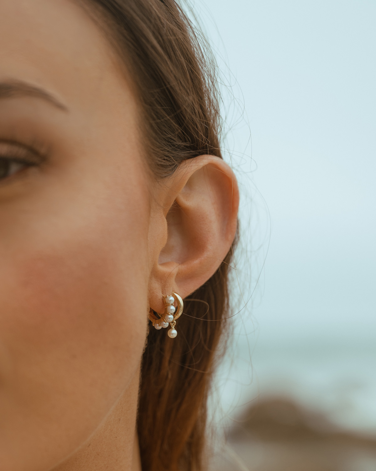 Mae Pearl Earring on ear